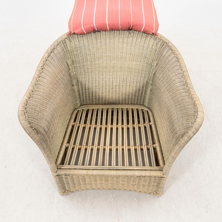 A Bonacina special edition rattan armchair 21st  century.