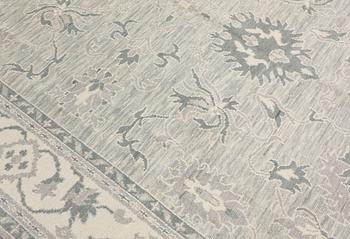 A rug, Ziegler design, approx. 368 x 279 cm.