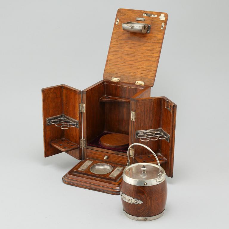 A small tobacco cabinet by BW & Co, early 20th century.