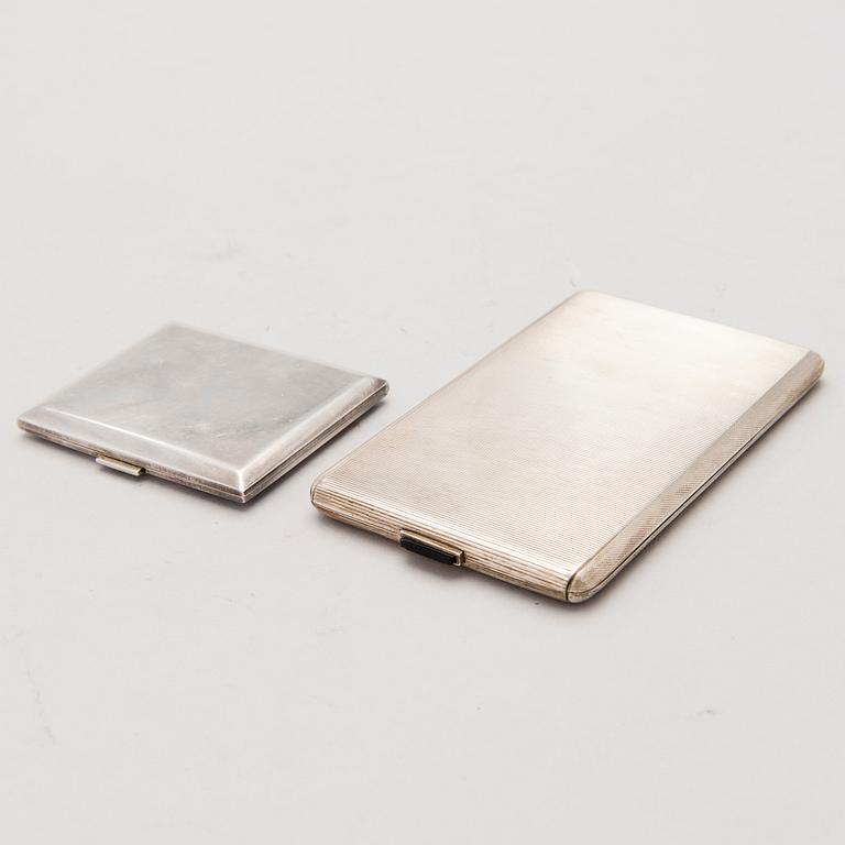 Two mid-20th Century, silver cases, with Swedish hallmarks.