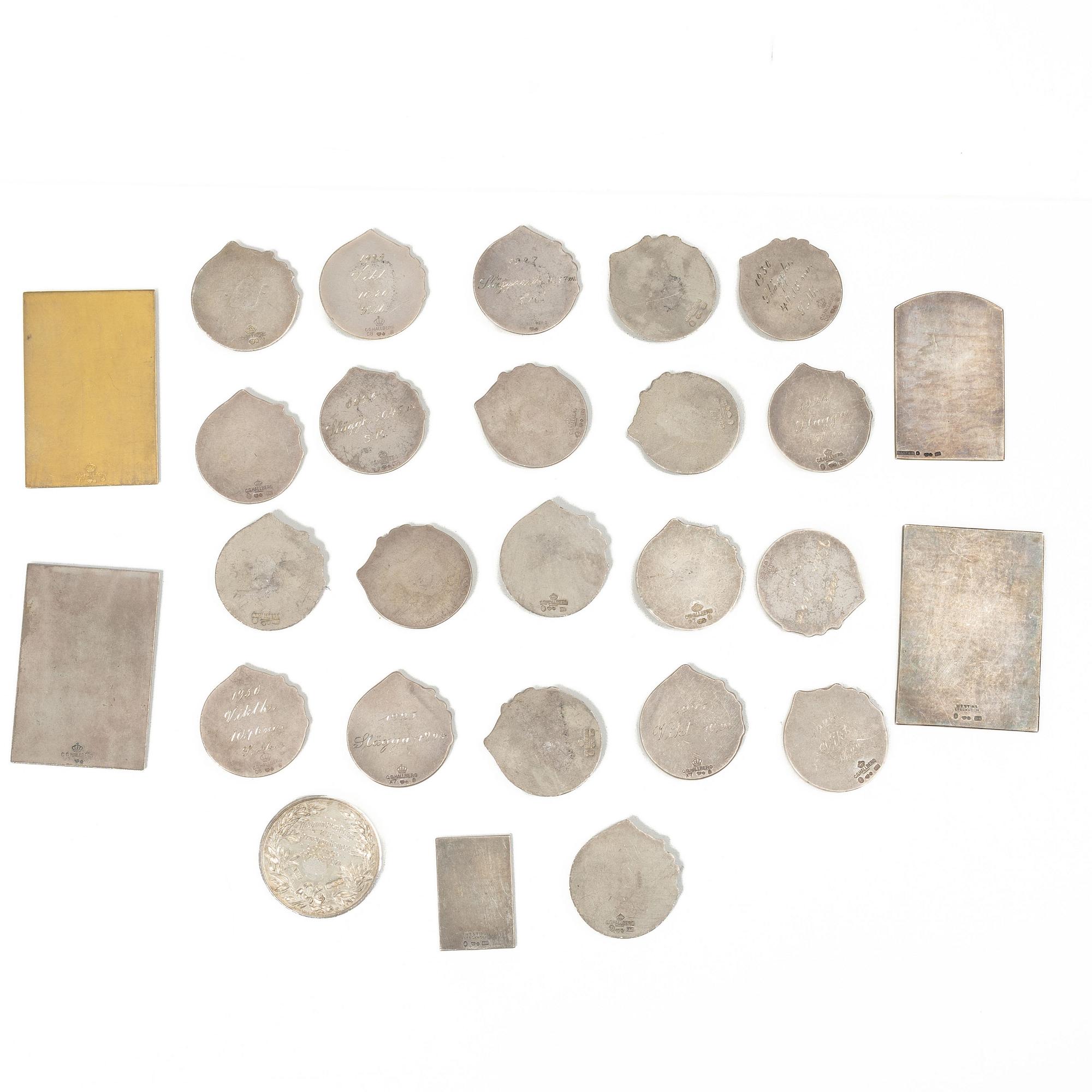 Plaques, 27, silver, Sweden and Great Britain, first half of the 20th century.