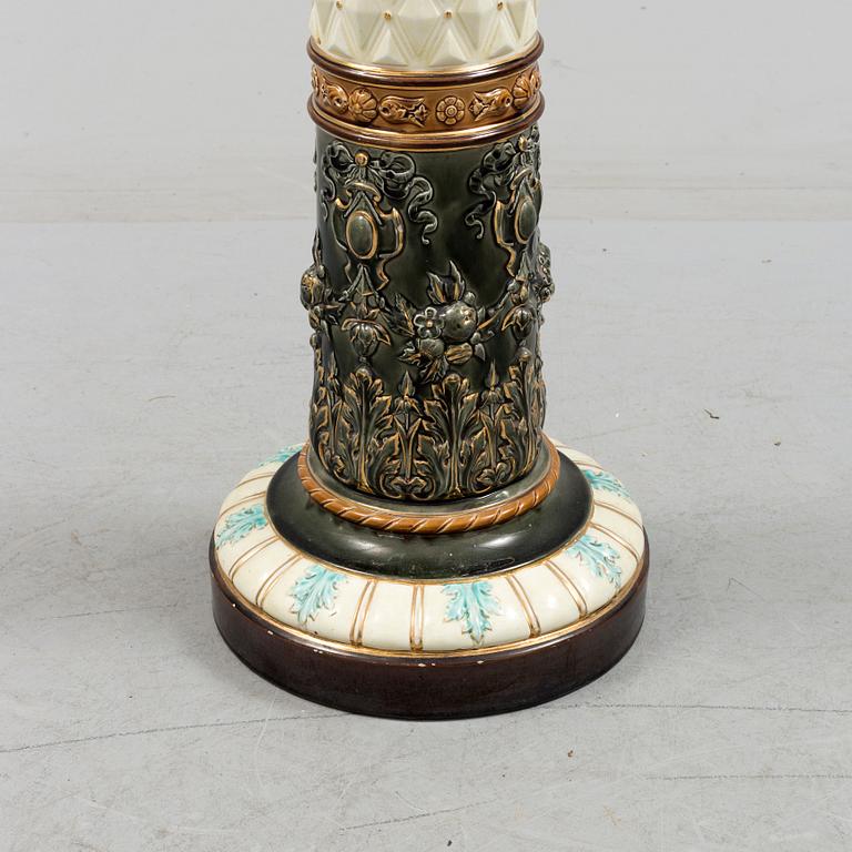 An end of the 19th century maiolica pedestal by Rörstrand.