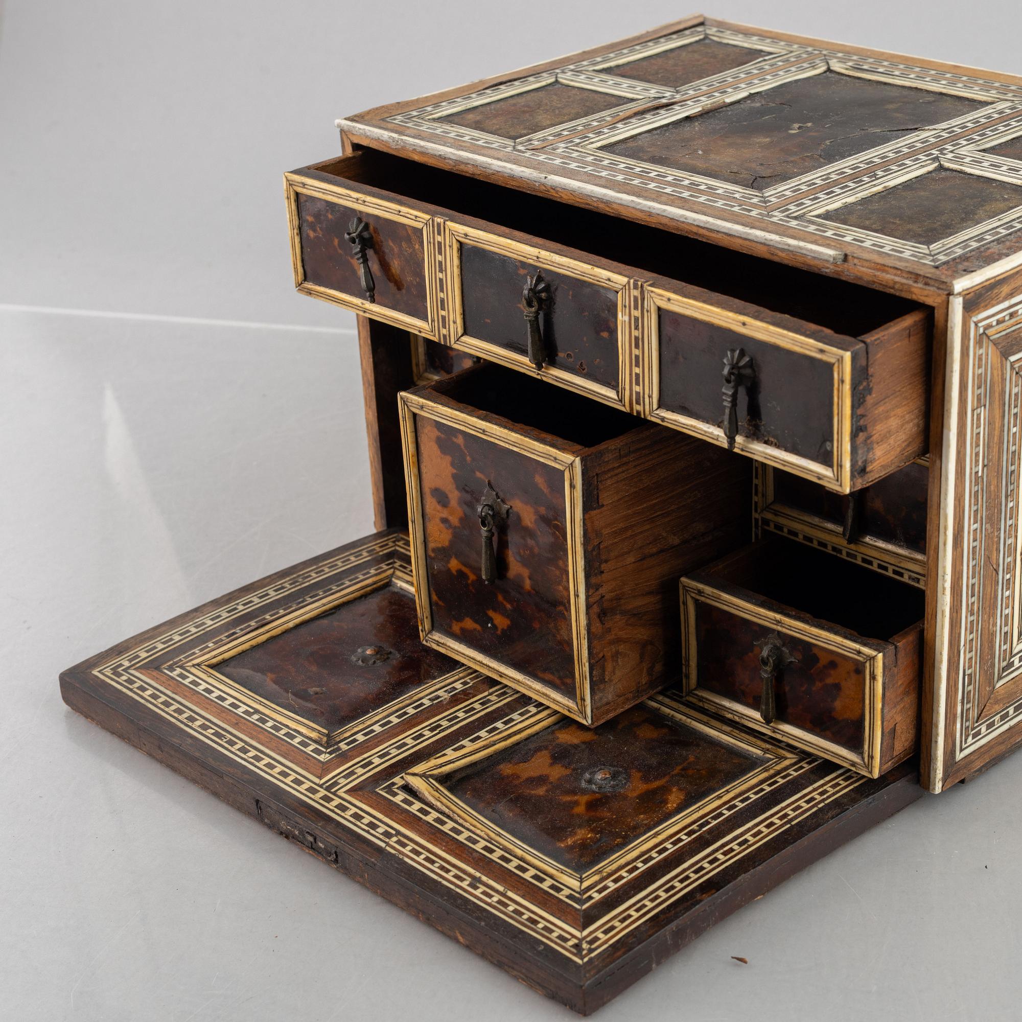 A Spanish colonial bone and tortoise inlayed writing-box, circa 1700.