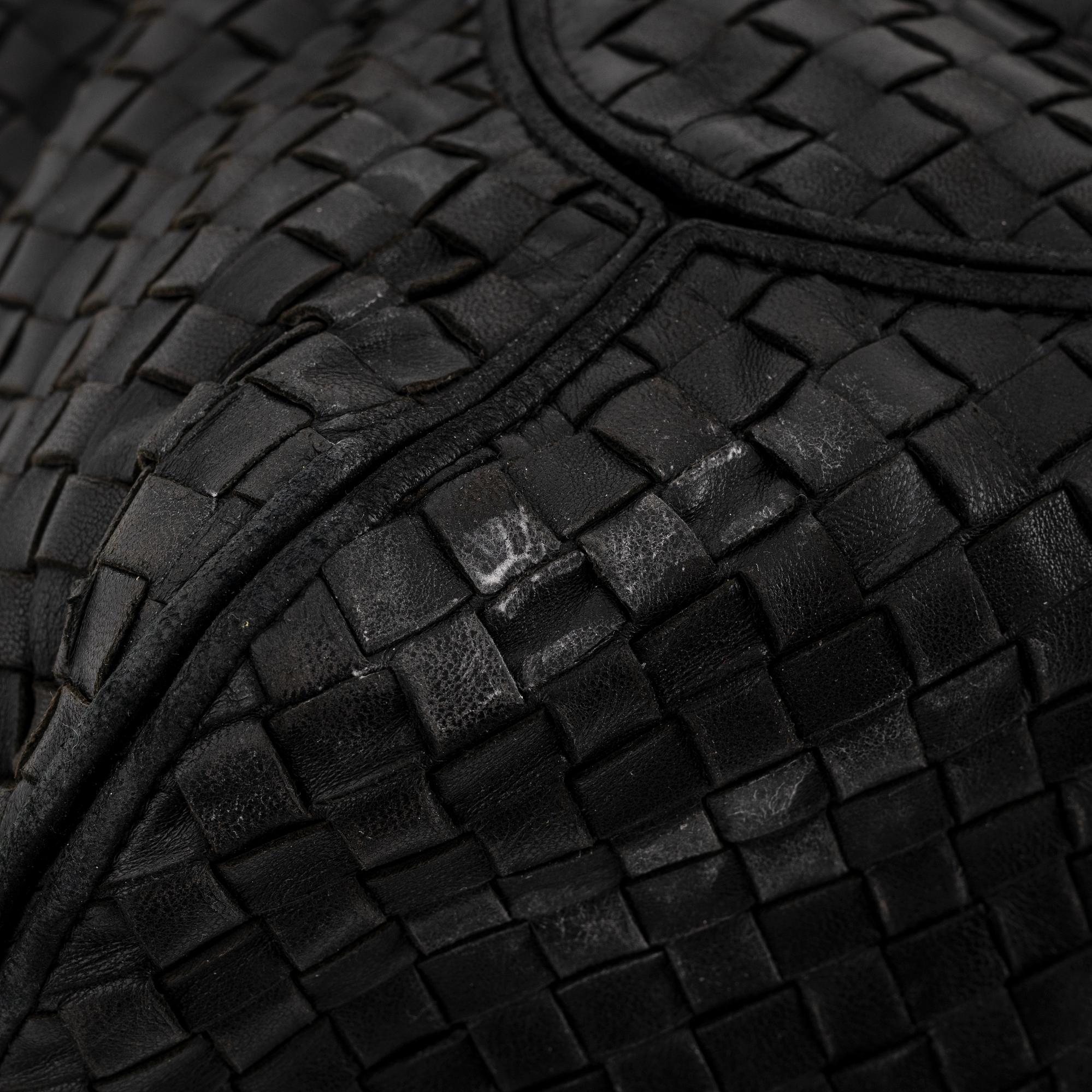 Bottega veneta, a black leather bag.