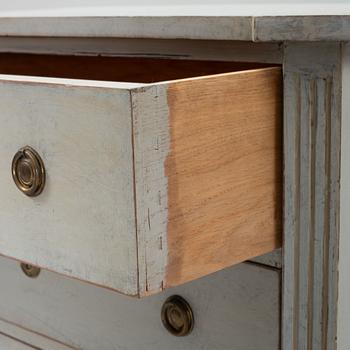 A Gustavian style chest of drawers, early 20th Century.