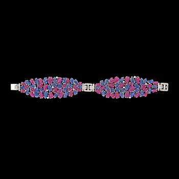 A ruby and sapphire Art deco style bracelet, brilliant cut diamond, tot. app. 0.90 cts.