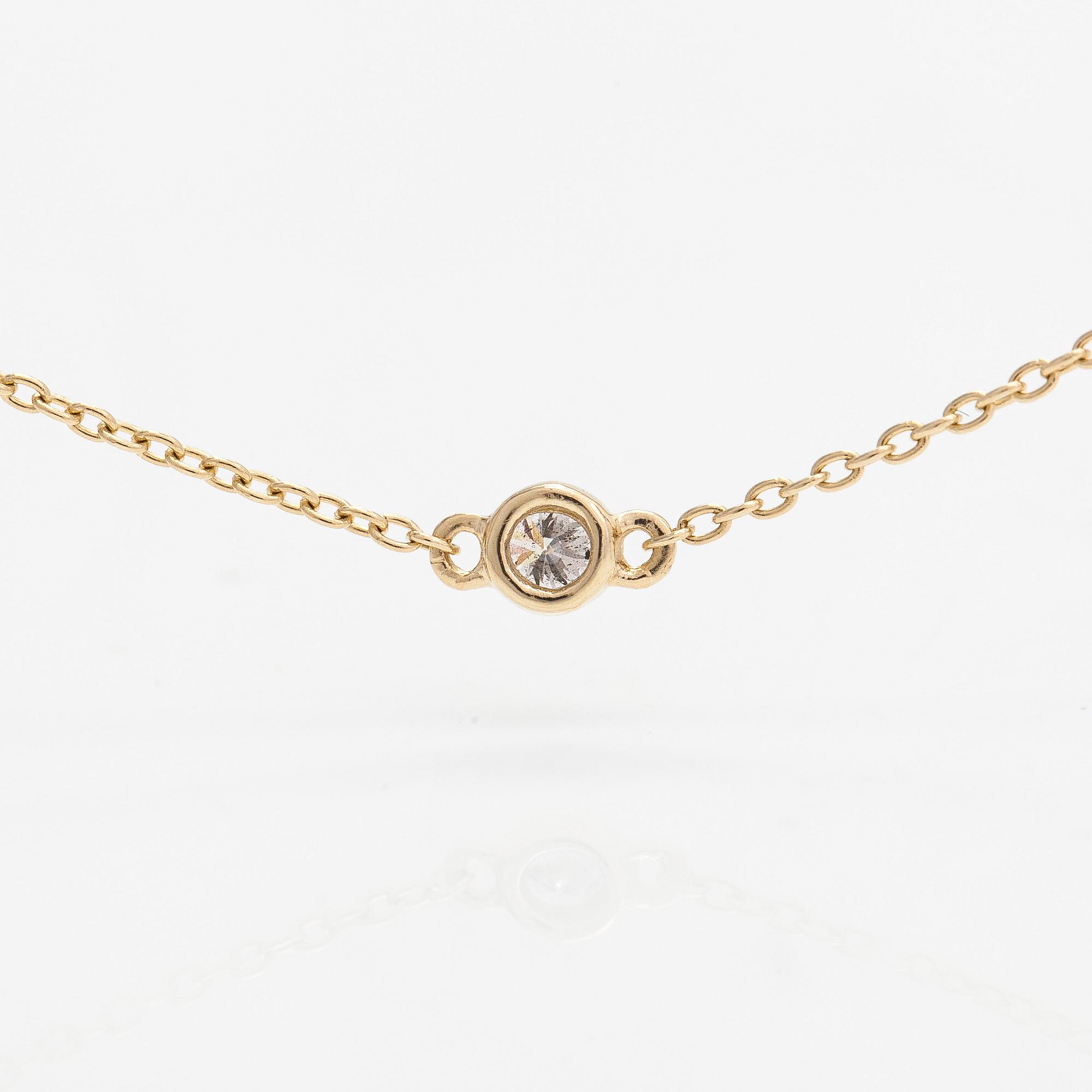 Halsband, 14K guld och diamanter ca 0.15 ct totalt.