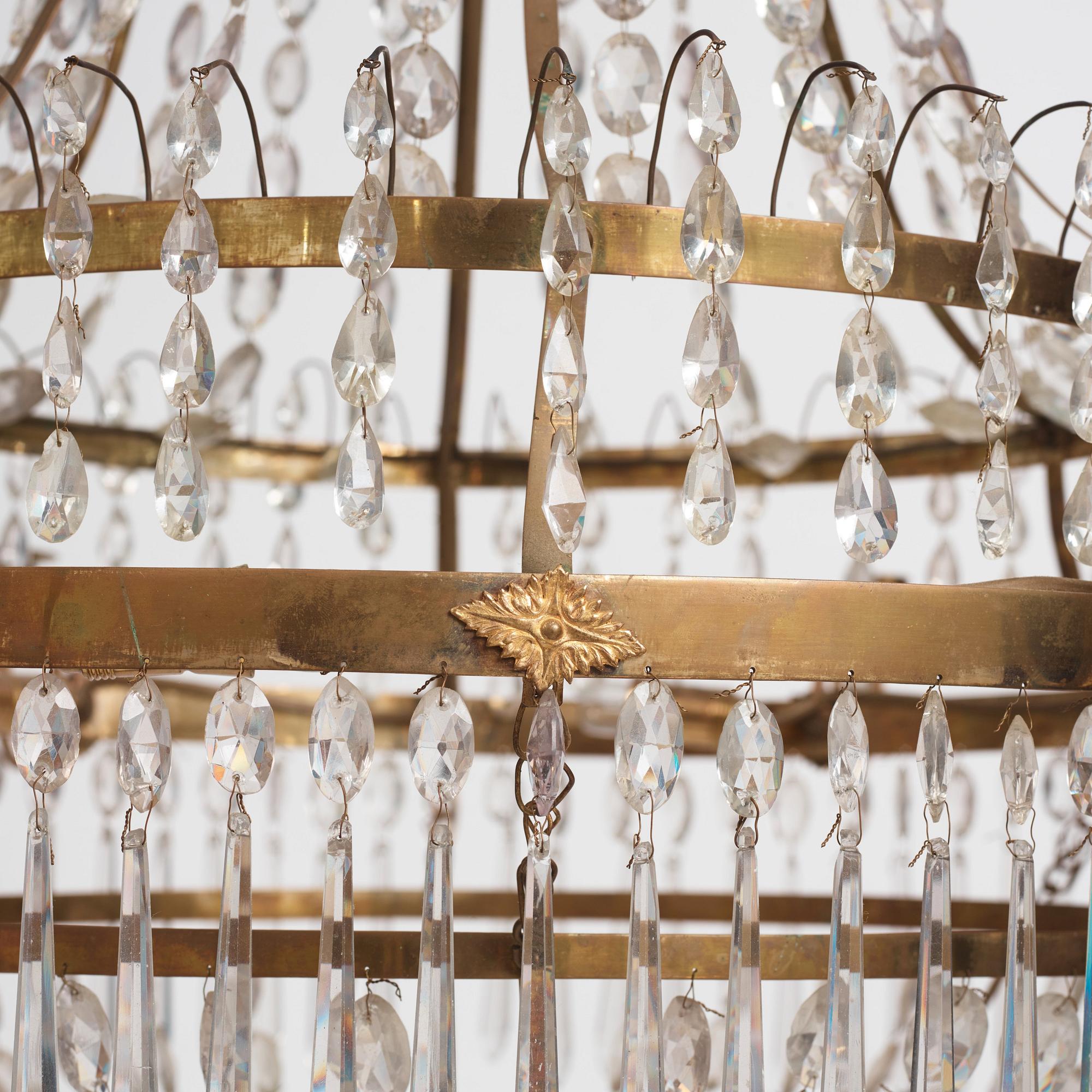 A late Gustavian gilt brass and cut glass seven-light chandelier, Stockholm, late 18th century.