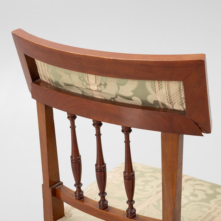 A sofa, two armchairs, four chairs and table, Empire style, 20th century.