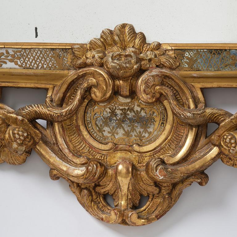 A rococo giltwood mirror, Stockholm, later part 18th century.