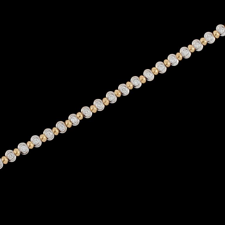 ARMLÄNK, 18k guld och vitguld med 30 briljantslipade diamanter, ca 1.20 ct, Italien, 1900-talets slut.  Vikt 19 g.