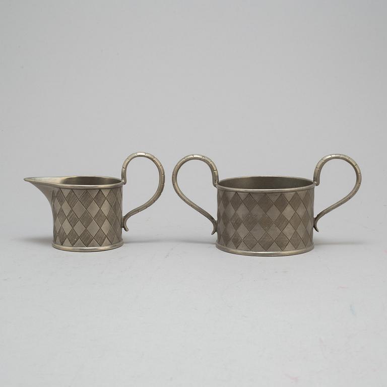 FIRMA SVENSKT TENN, a pewter sugarbowl and creamer Model nr 170, Stockholm 1927.