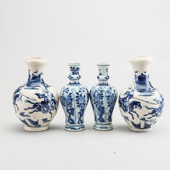 A set of two pairs of Kangxi and Kangxi style blue and white porcelain vases.