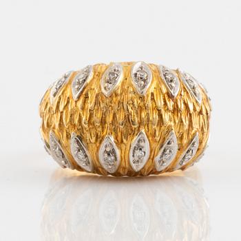 Gold and eight diamond ring.