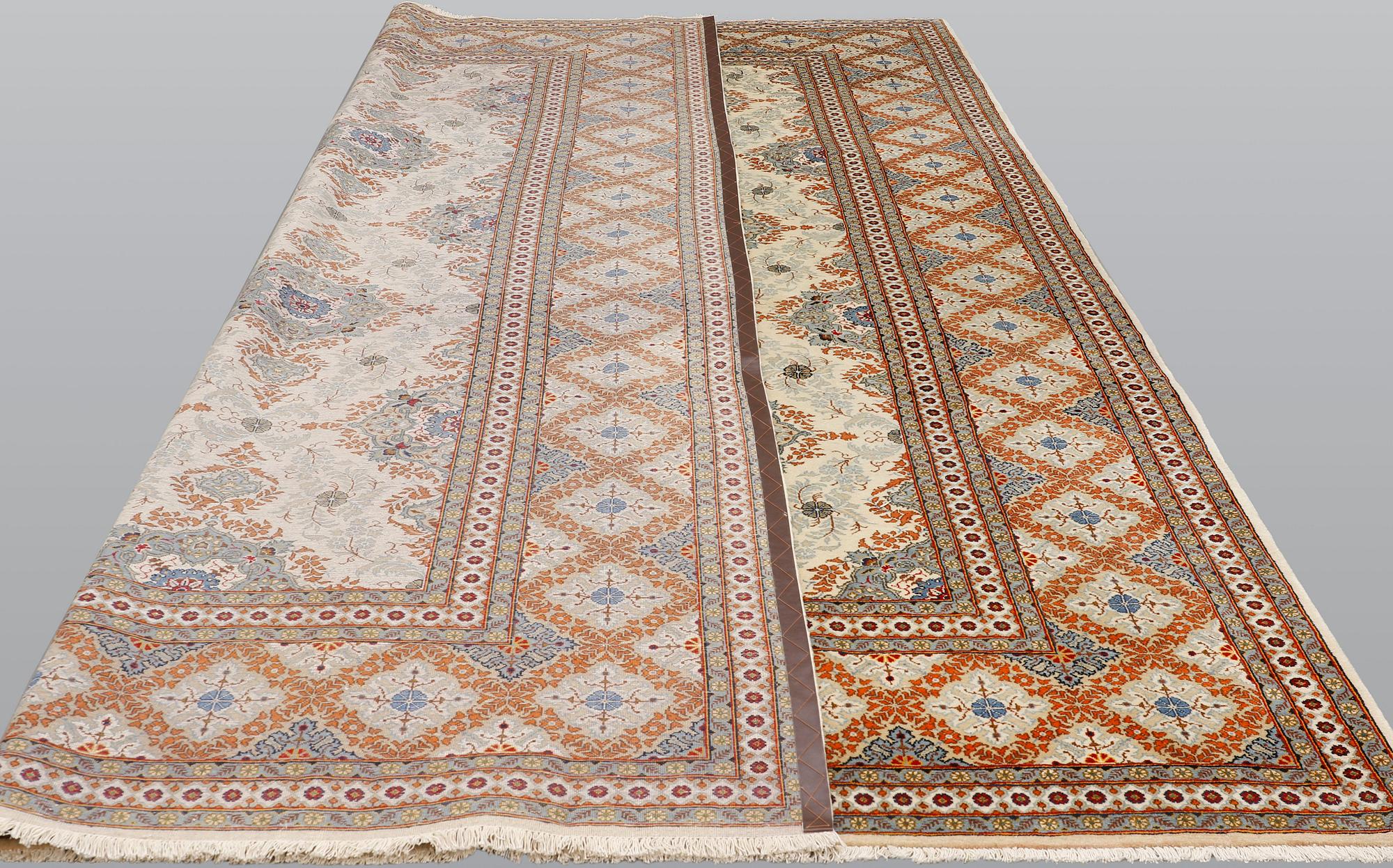 A Keshan carpet, 382 x 280 cm.