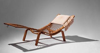 Hans J. Wegner, an oak chaise longue 'Hammock Chair GE2', Getama, Denmark, early 1960s.