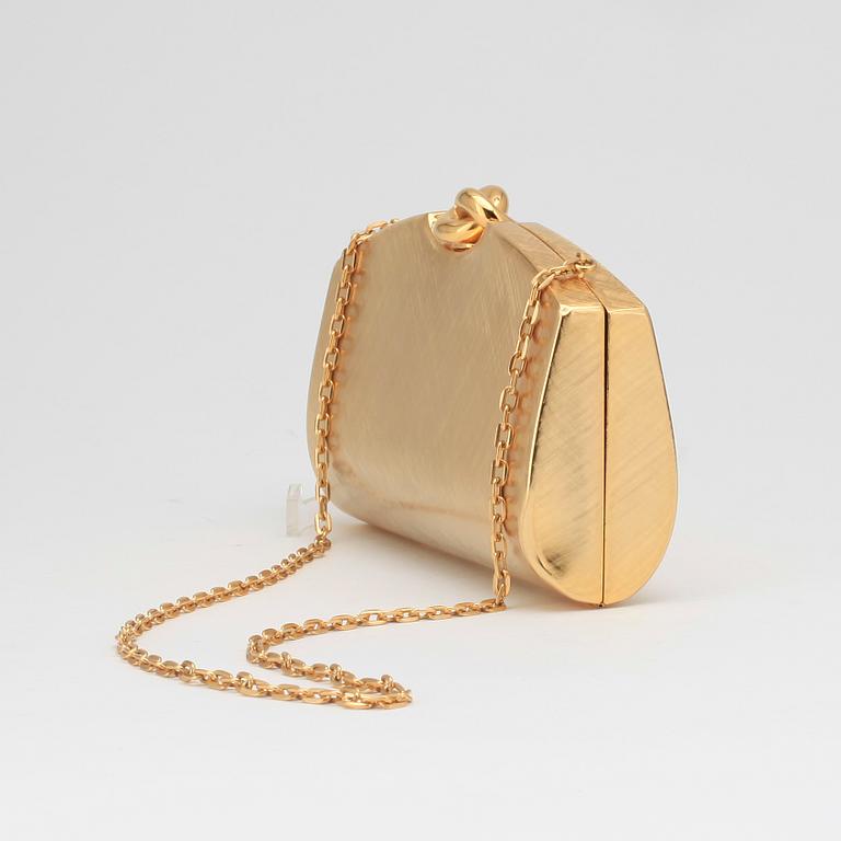RODO, a brass evening bag.
