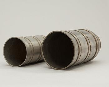 Two Edvin Ollers pewter and brass vases, Schreuder & Olsson, Stockholm 1937 och 1960.