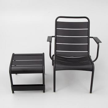 A 'Luxembourg' lounge chair and a foot stool, Fermob.