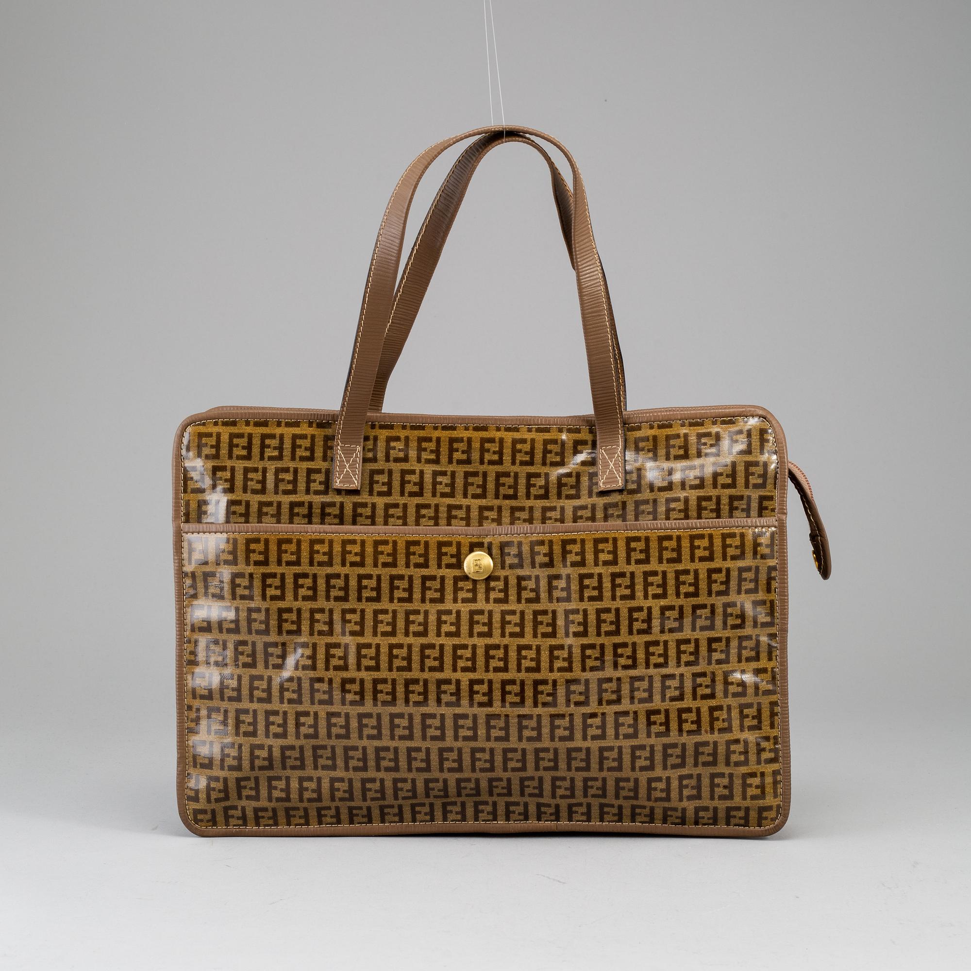 FENDI, a textile handbag.