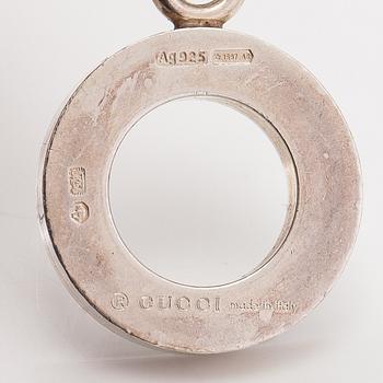 Gucci, A pair of earrings, bracelet, ring and necklace made of sterling silver. Marked Gucci, Made in Italy.