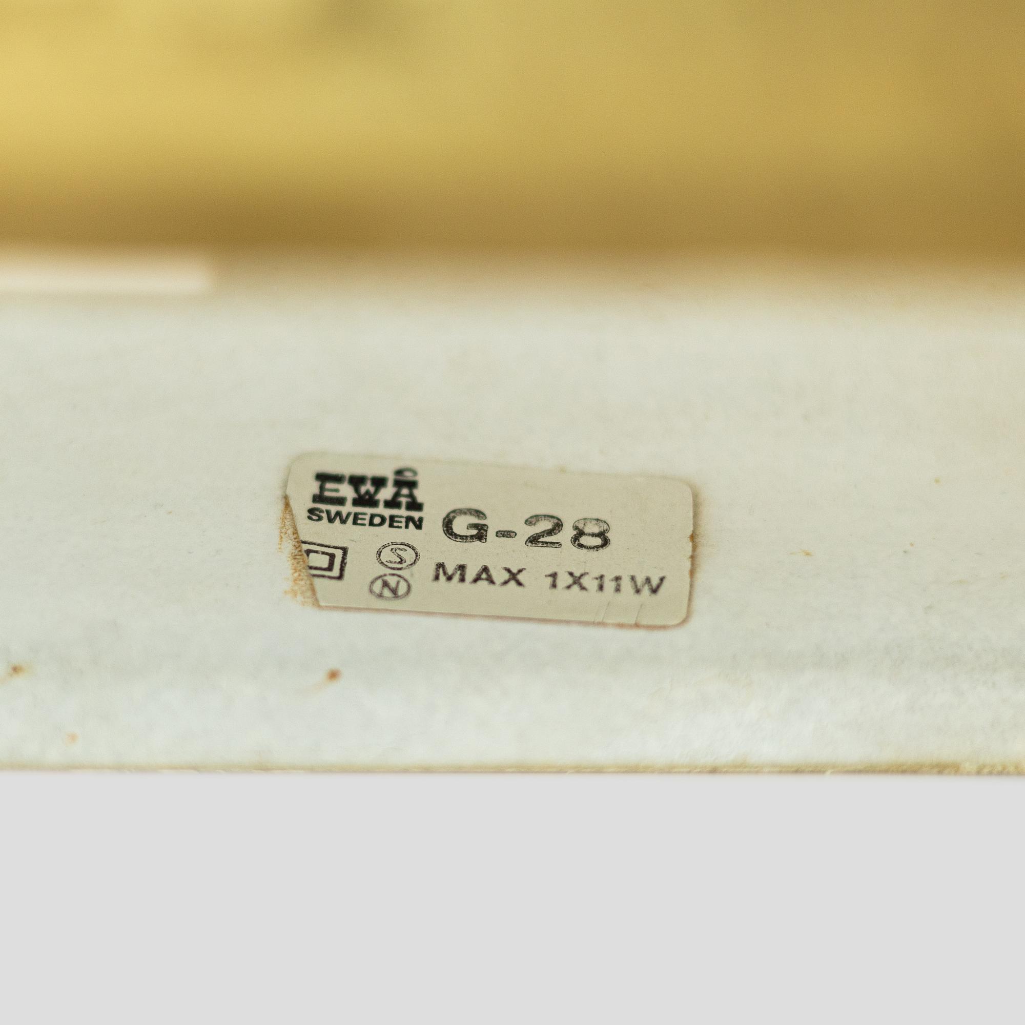 A pair of brass 'G-28' EWÅ floor lamps, late 1900's.