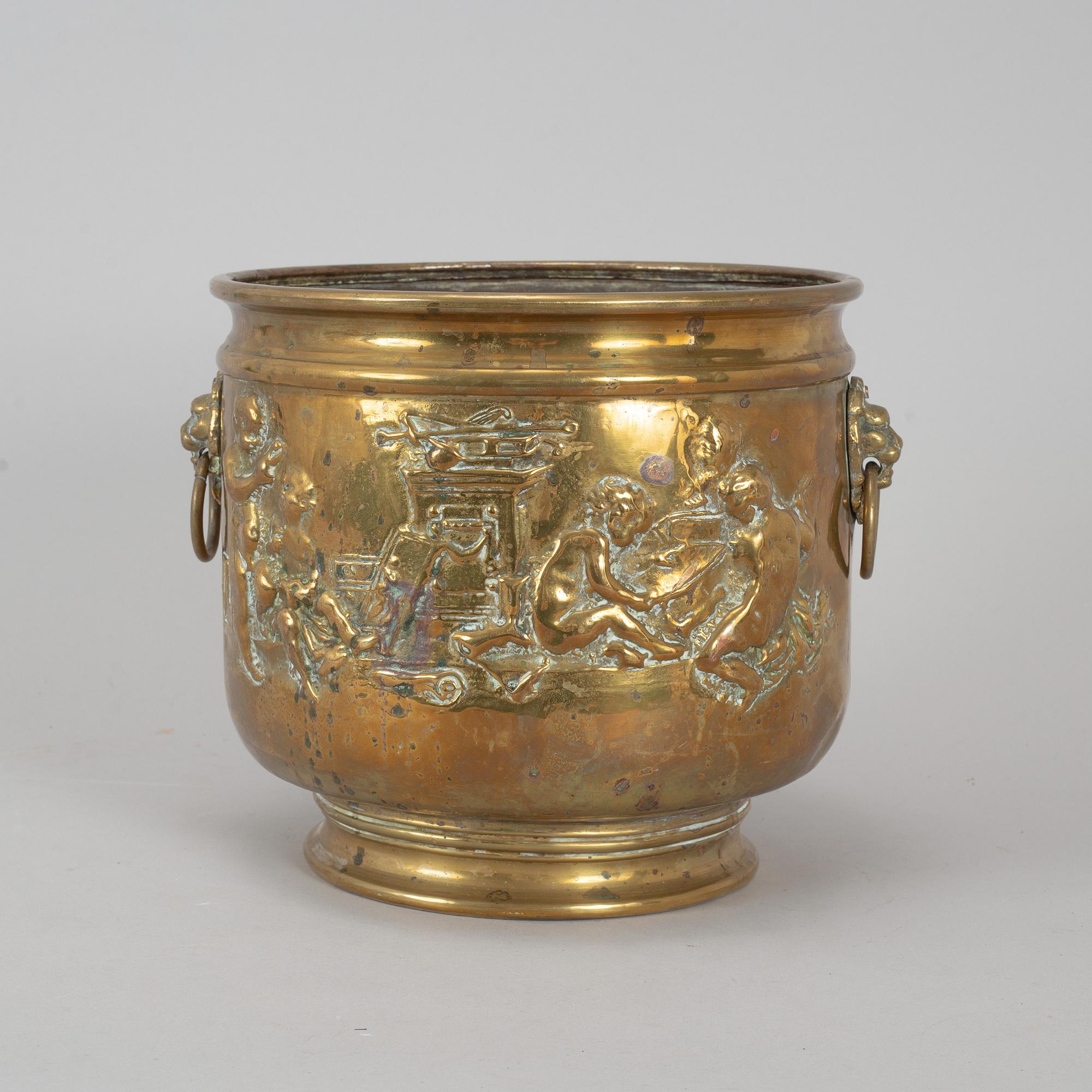 A 19th century brass flower pot.