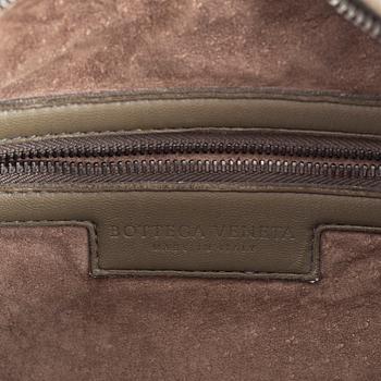 Bottega Veneta, a grey intrecciato leather bag.