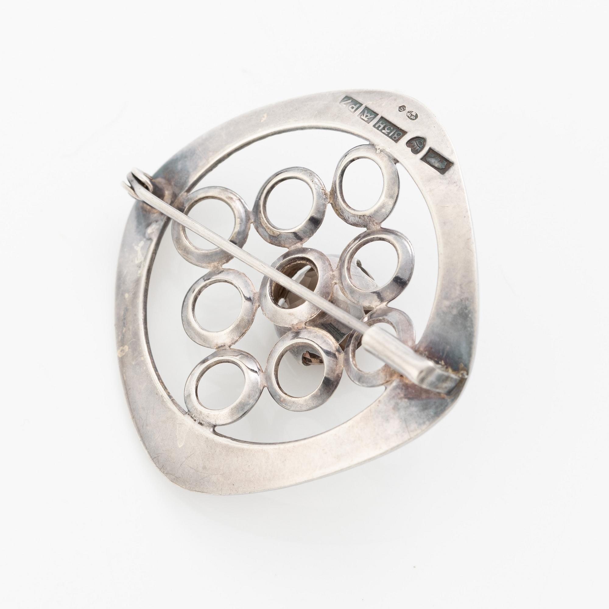 Arm ring and brooch, silver with smoky quartz, Kultasepät Salovaara.