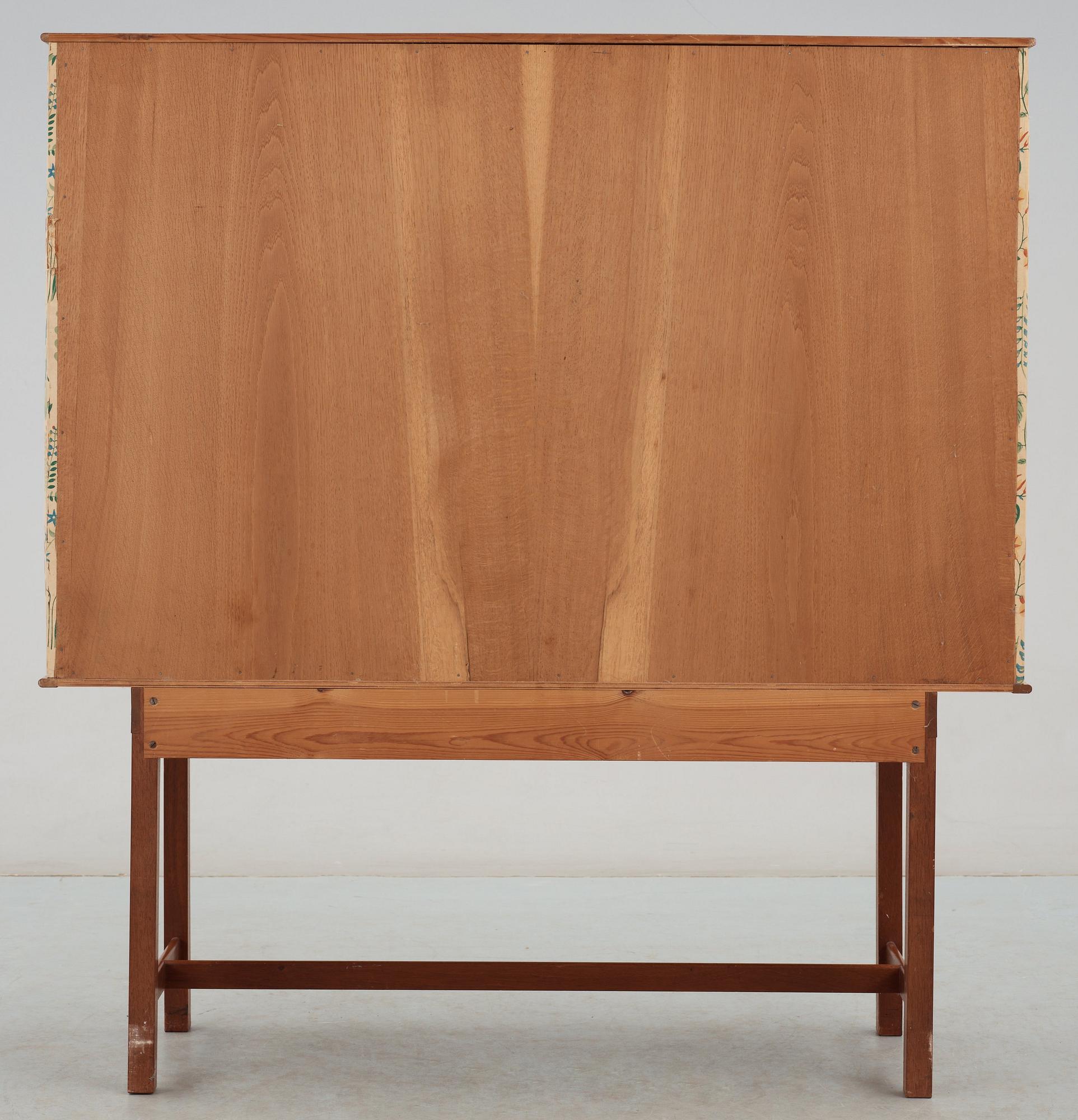A Josef Frank mahogany cabinet, doors and sides covered in Frank's floral chintz fabric 'Fatima', Svenskt Tenn ca 1937.