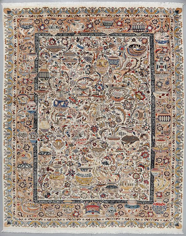 A Kashmar rug, part silk, 396 x 293 cm.