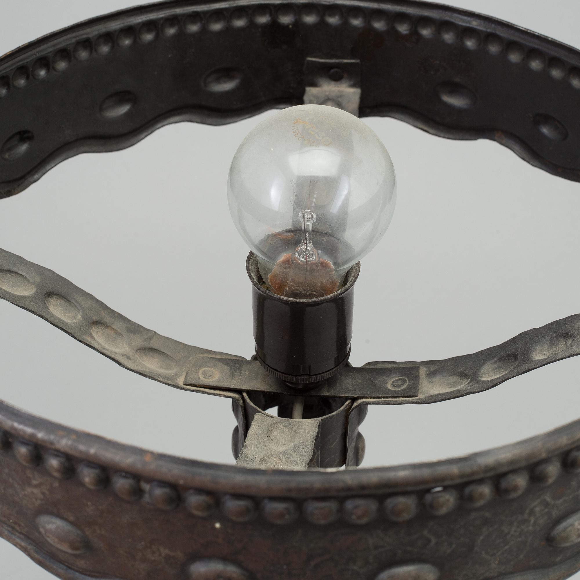 A early 20th century metal table light.
