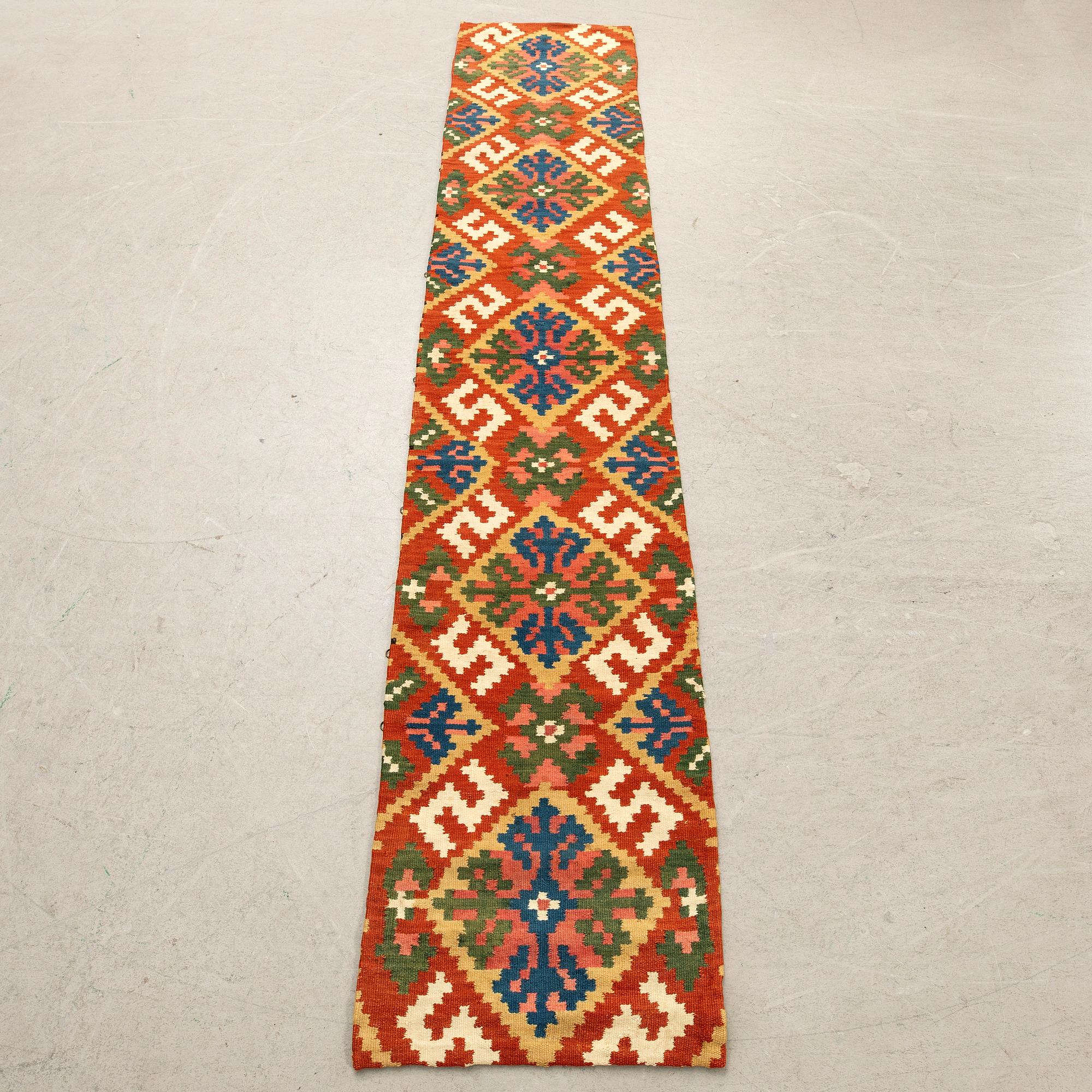 A bench cushion, flat weave, probably Västergötland, approx. 240 x 47 cm, first half of the 19th century.