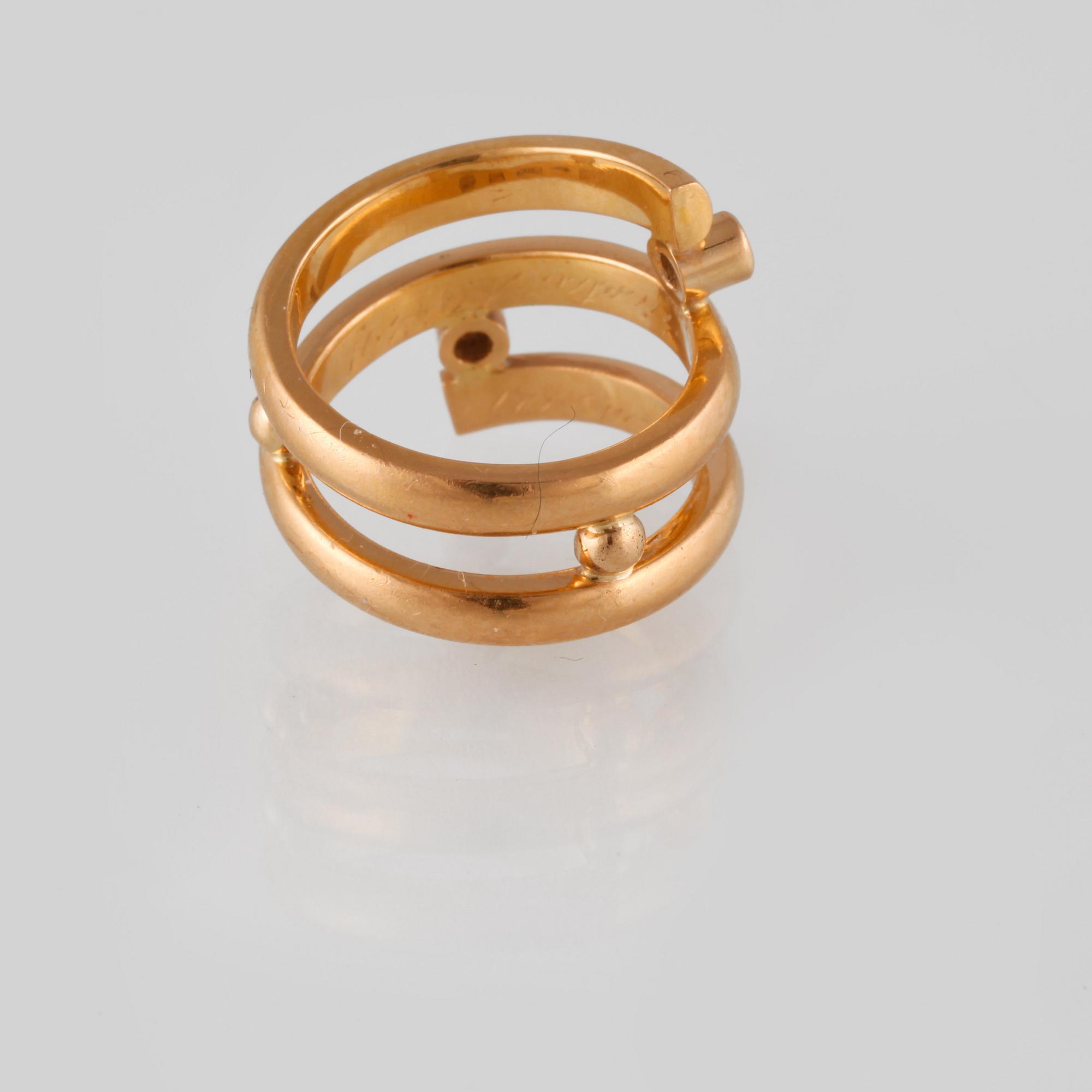 RING, 20K guld med 2 briljantslipade diamanter ca 0.06 ct. Vikt 11,9 gram.