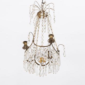 A Gustavian three-light chandelier, Stockholm, late 18th century.