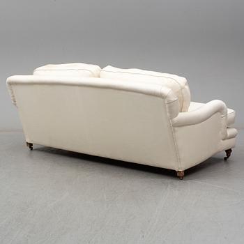 A contemporary Howard sofa.