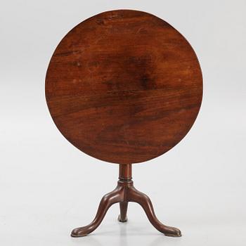 A drop-leaf table, England, 19th Century.