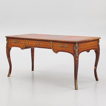 A Louis XV-style bureau plat desk, early 20th century.