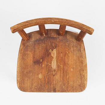 Axel Einar Hjorth, a set of seven stained pine "Utö" chairs, Nordiska Kompaniet, Sweden, 1930s.