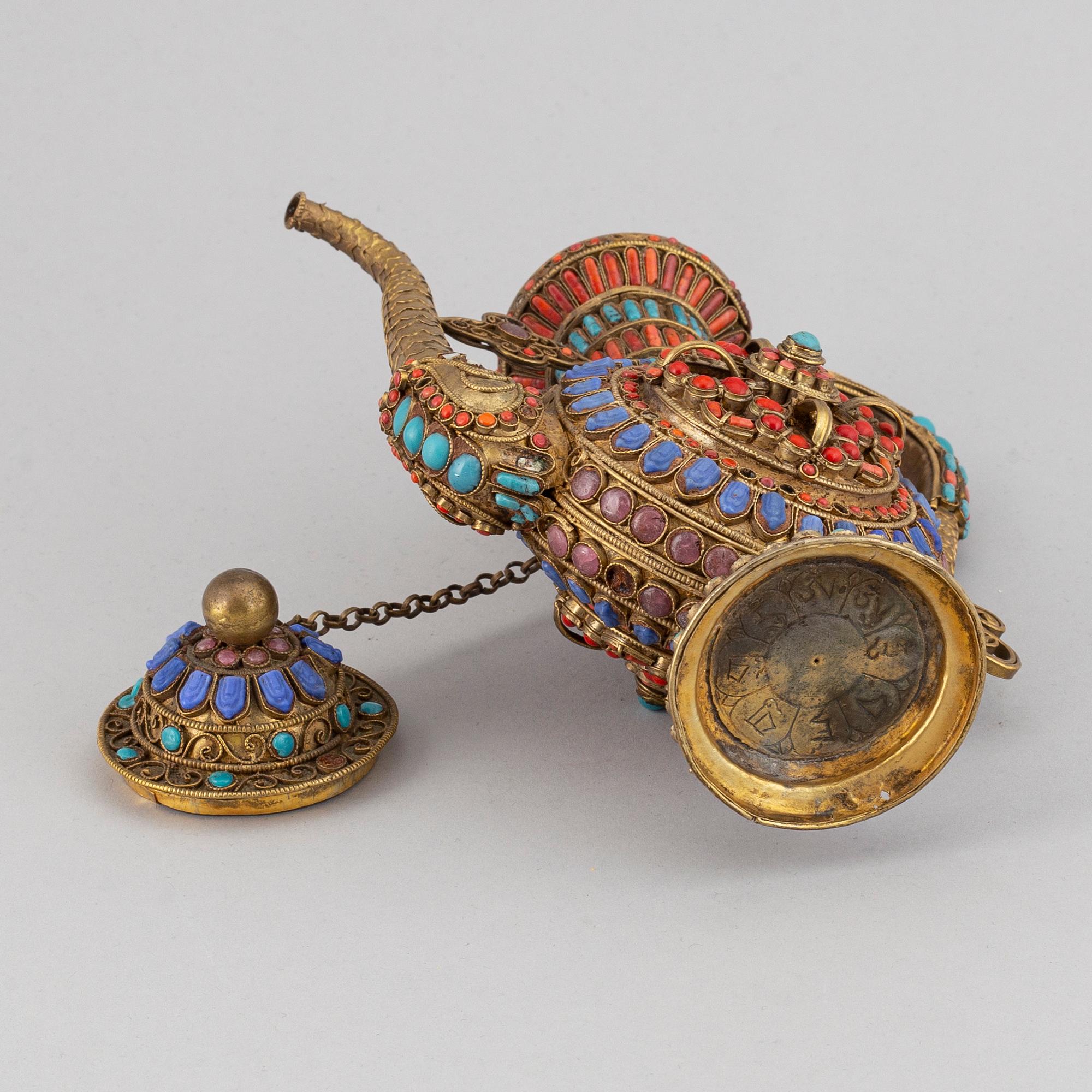 A Tibetan metal and stone inlay pot, 20th century.