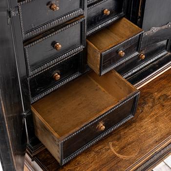 A Baroque cabinet, 18th Century.