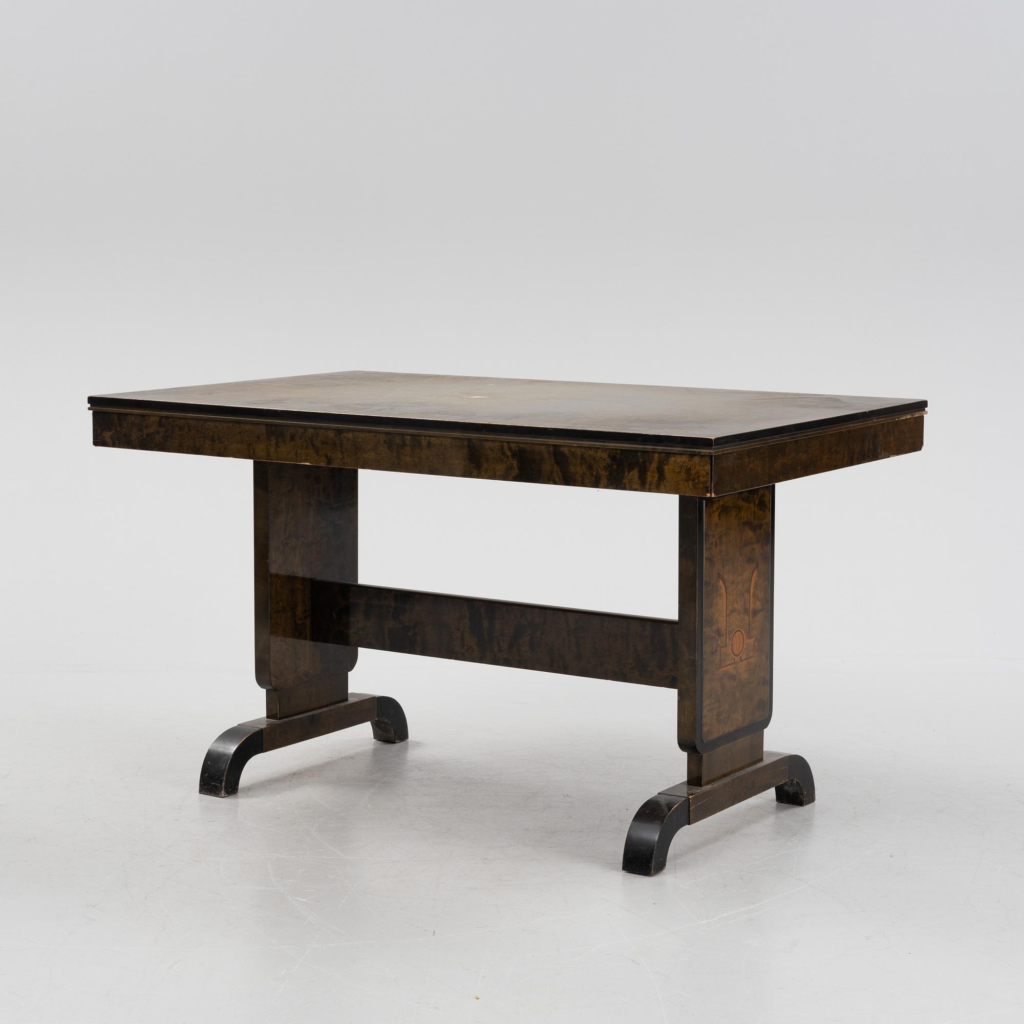 A Swedish Grace birch dining table and four chairs, 1920's/1930's.