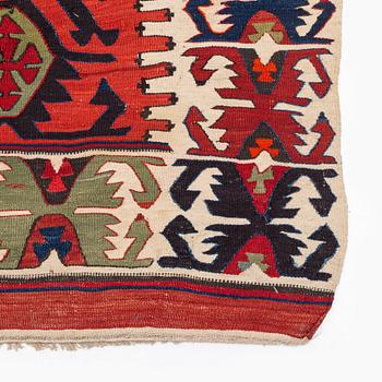 An antique southeast Anatolian kilim, c. 412 x 163 cm.