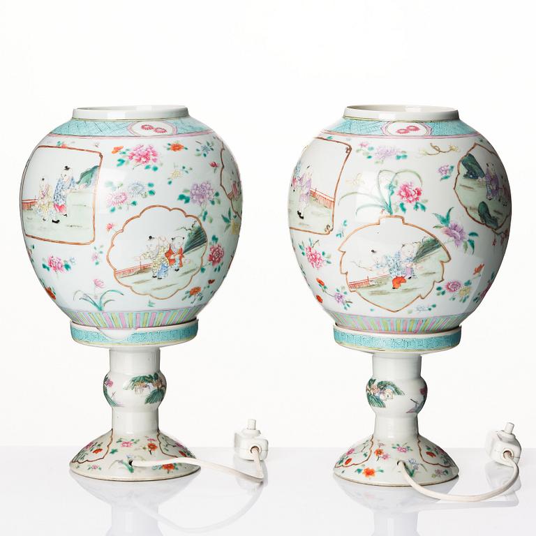 A pair of famille rose lanterns with stands, late Qing dynasty.