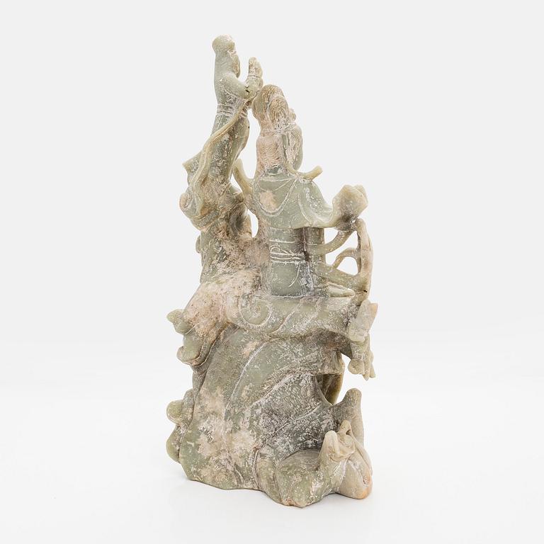 A large soapstone sculpture group of Guanyin, 20th century.