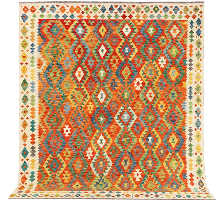 A kilim carpet, c. 303 x 256 cm.