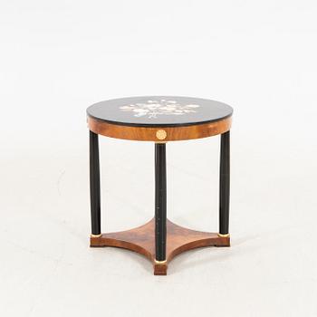An empire style table with pietradura top around 1900.