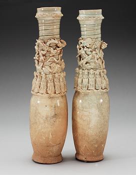 A set of two green glazed vases with covers, Yuan dynasty (1271-1368).