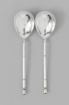 A PAIR OF 19TH CENTURY RUSSIAN SILVER SPOONS, makers mark of Mikhail Grachev, St. Petersburg 1880's.