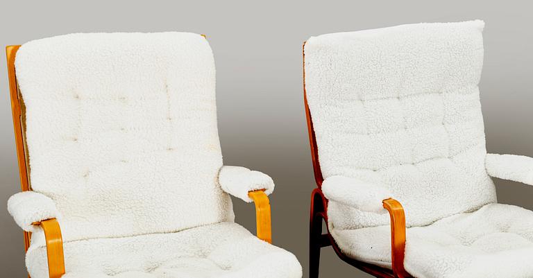 BRUNO MATHSSON, a pair of Ingrid armchairs for DUX later part of the 20th century.